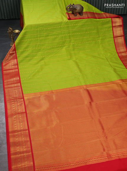 Semi kanchipuram silk saree light green and red with allover zari weaves and zari woven korvai border
