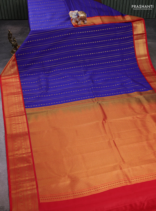 Semi kanchipuram silk saree blue and red with allover zari weaves and zari woven korvai border