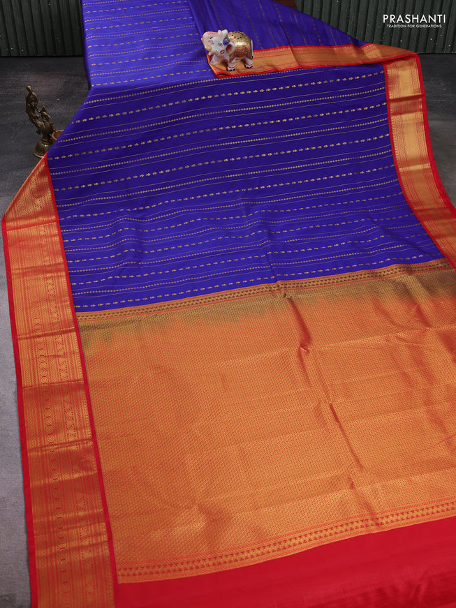Semi kanchipuram silk saree blue and red with allover zari weaves and zari woven korvai border