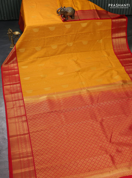 Semi kanchipuram silk saree mustard yellow and red with allover zari weaves & buttas and zari woven korvai border