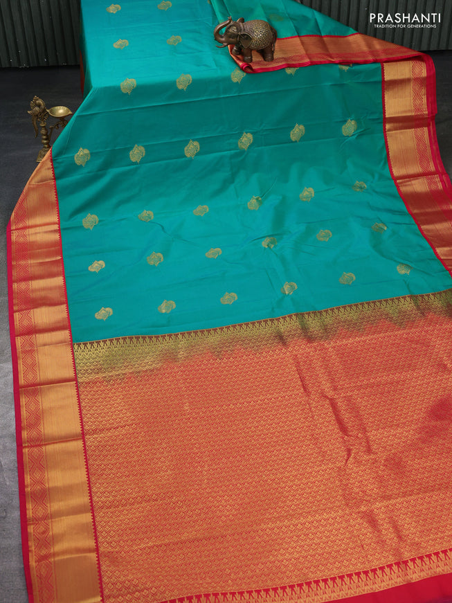 Semi kanchipuram silk saree green and pink with zari woven buttas and zari woven border