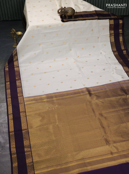 Semi kanchipuram silk saree off white and deep jamun with zari woven buttas and rettapet zari woven border