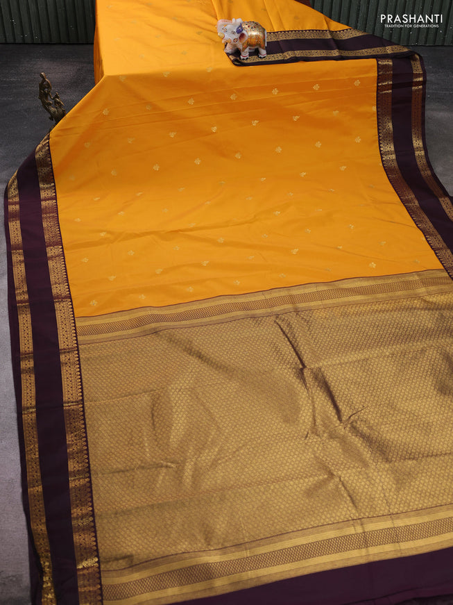 Semi kanchipuram silk saree mango yellow and deep jamun with zari woven buttas and rettapet zari woven border