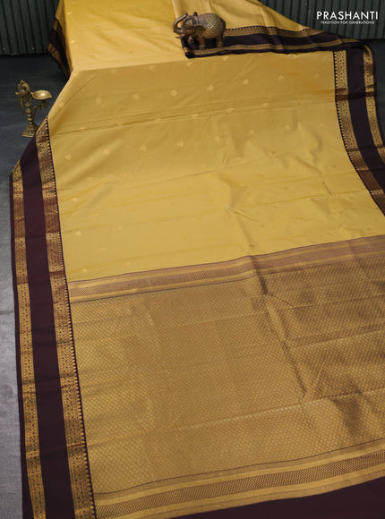 Semi kanchipuram silk saree sandal and brown with zari woven buttas and rettapet zari woven border
