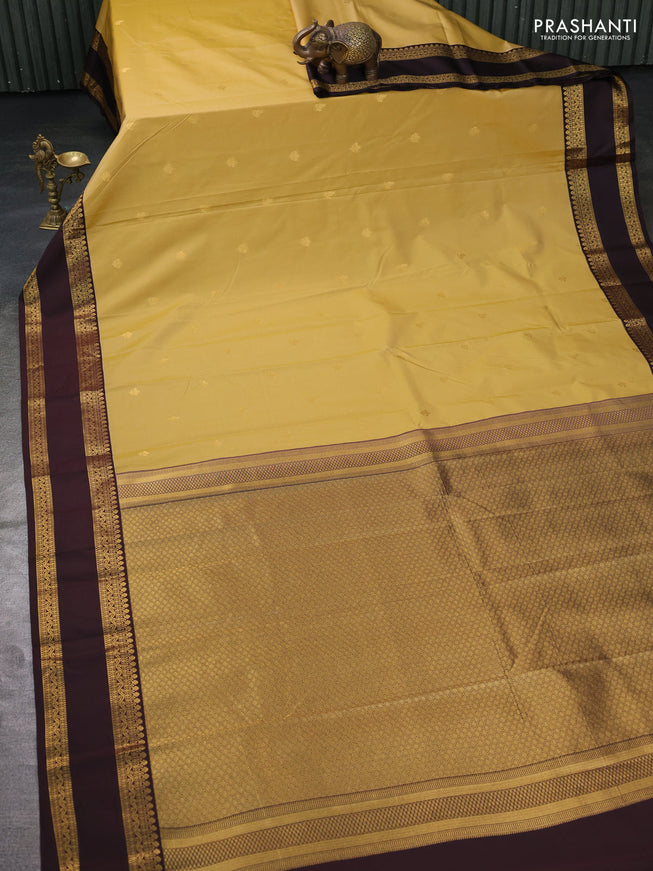 Semi kanchipuram silk saree sandal and brown with zari woven buttas and rettapet zari woven border