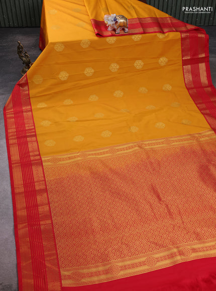 Semi kanchipuram silk saree mustard yellow and red with zari woven buttas and zari woven koravi border