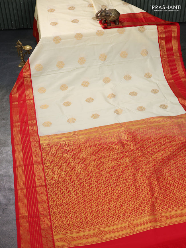 Semi kanchipuram silk saree off white and red with zari woven buttas and zari woven koravi border