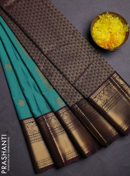 Semi kanchipuram silk saree teal green and brown with zari woven buttas and zari woven koravi border