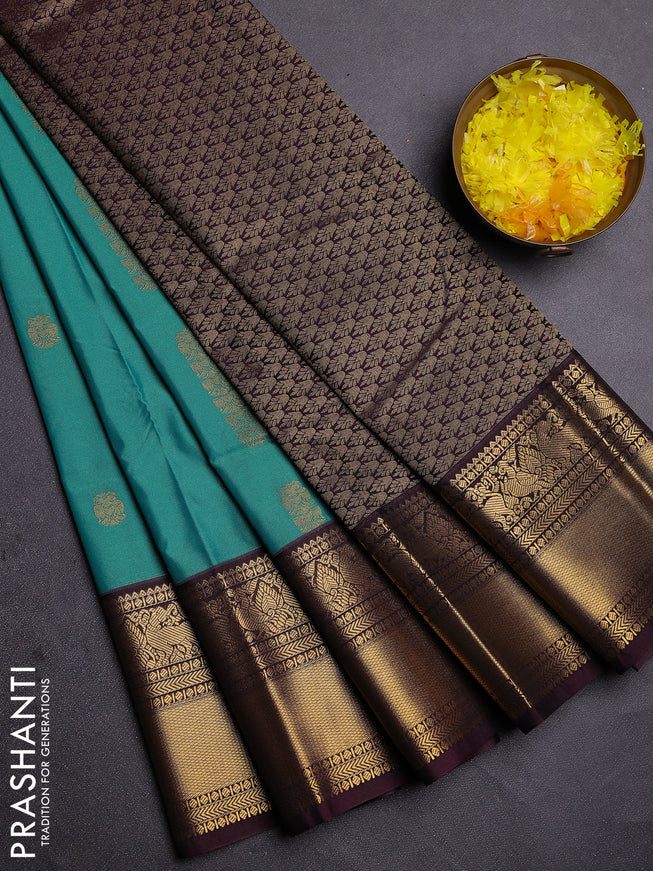 Semi kanchipuram silk saree teal green and brown with zari woven buttas and zari woven koravi border