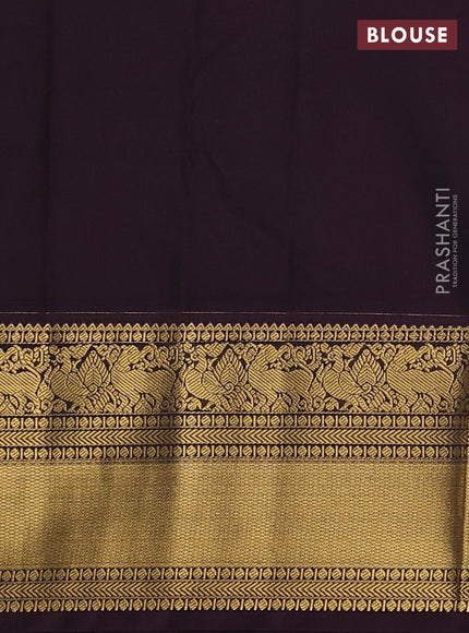 Semi kanchipuram silk saree light green and brown with zari woven buttas and zari woven koravi border
