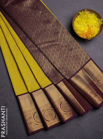 Semi kanchipuram silk saree lime yellow and deep wine with allover zari weaves and zari woven korvai border