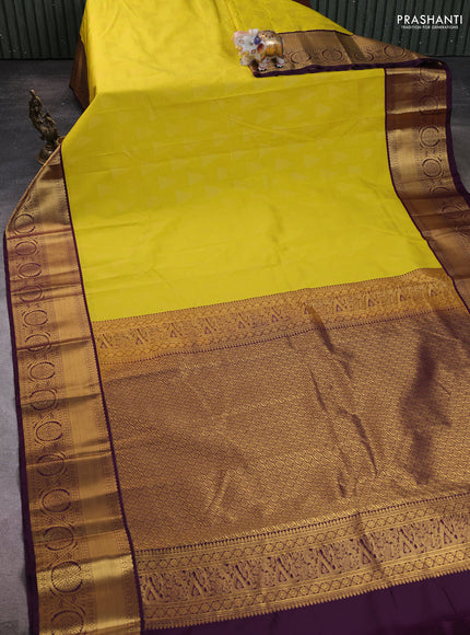 Semi kanchipuram silk saree lime yellow and deep wine with allover zari weaves and zari woven korvai border