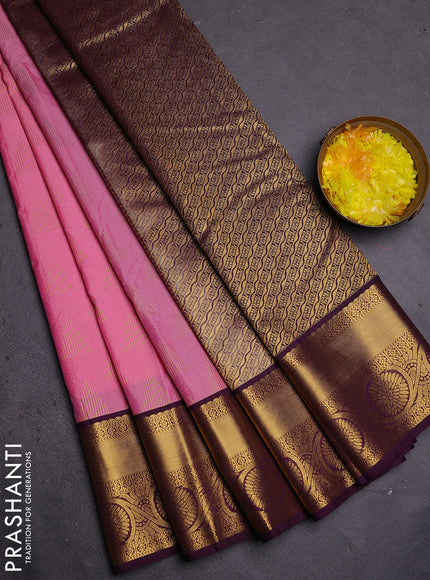 Semi kanchipuram silk saree light pink and deep wine with allover zari weaves and zari woven korvai border