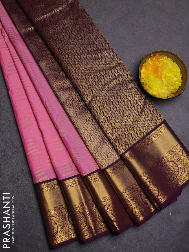 Semi kanchipuram silk saree light pink and deep wine with allover zari weaves and zari woven korvai border