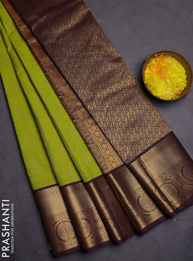 Semi kanchipuram silk saree light green and deep wine with allover zari weaves and zari woven korvai border