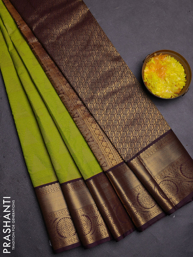 Semi kanchipuram silk saree light green and deep wine with allover zari weaves and zari woven korvai border
