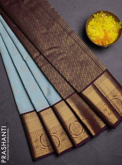 Semi kanchipuram silk saree pastel blue and deep wine with allover zari weaves and zari woven korvai border
