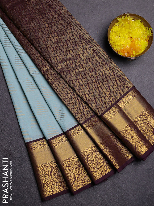 Semi kanchipuram silk saree pastel blue and deep wine with allover zari weaves and zari woven korvai border
