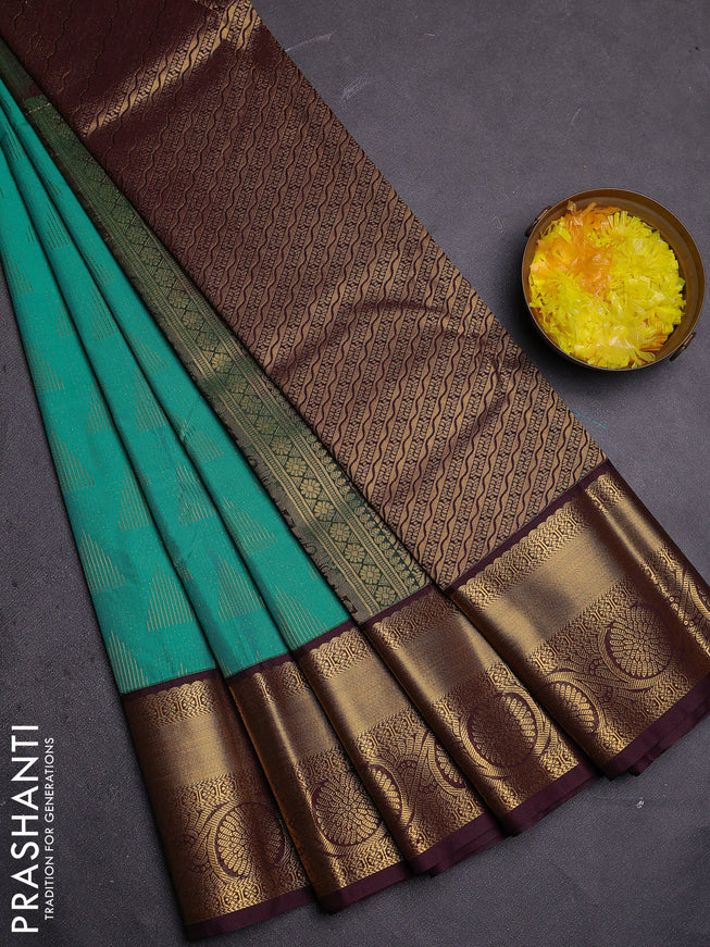Semi kanchipuram silk saree teal green and deep wine with allover zari weaves and zari woven korvai border