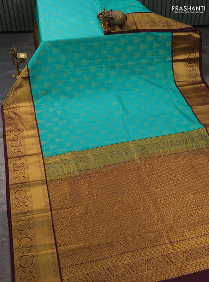 Semi kanchipuram silk saree teal green and deep wine with allover zari weaves and zari woven korvai border