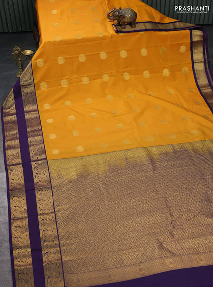Semi kanchipuram silk saree mustard yellow and deep violet with zari woven buttas and rettapet zari woven border