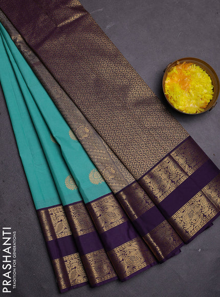Semi kanchipuram silk saree teal green and deep violet with zari woven buttas and rettapet zari woven border