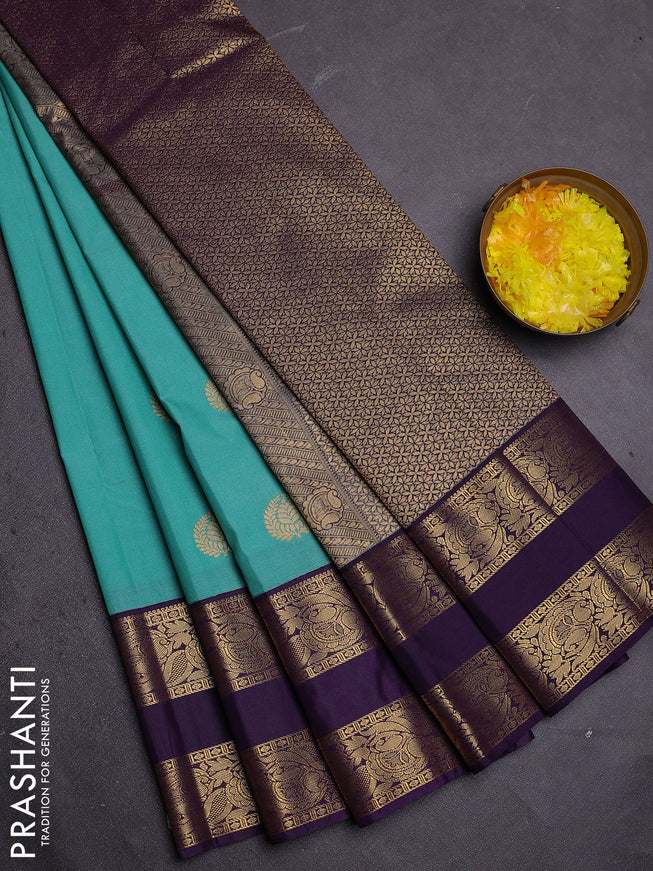 Semi kanchipuram silk saree teal green and deep violet with zari woven buttas and rettapet zari woven border
