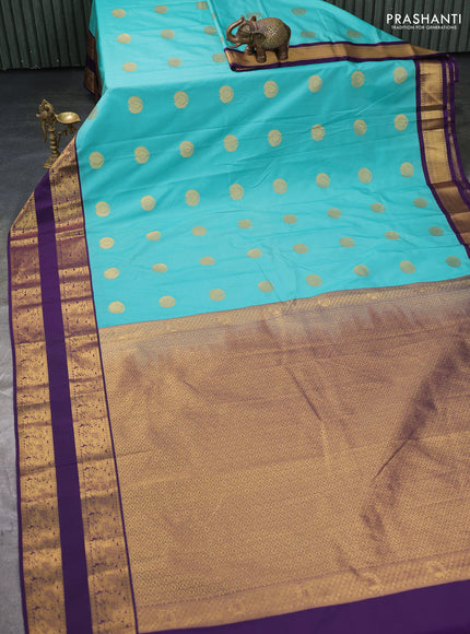 Semi kanchipuram silk saree teal green and deep violet with zari woven buttas and rettapet zari woven border