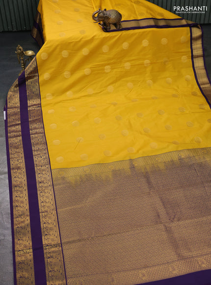 Semi kanchipuram silk saree yellow and deep violet with zari woven buttas and rettapet zari woven border