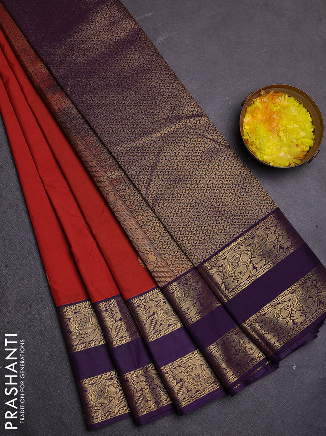 Semi kanchipuram silk saree rustic orange and deep violet with zari woven buttas and rettapet zari woven border