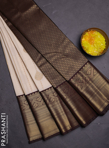 Semi kanchipuram silk saree off white and coffee brown with allover zari weaves and long zari woven border