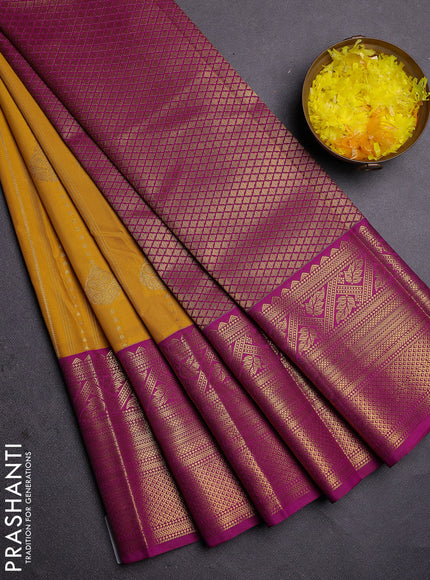 Semi kanchipuram silk saree yellow and purple with allover zari weaves and long zari woven border