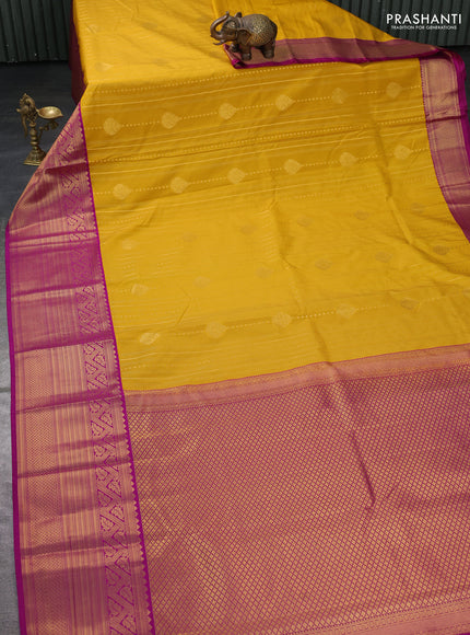 Semi kanchipuram silk saree yellow and purple with allover zari weaves and long zari woven border