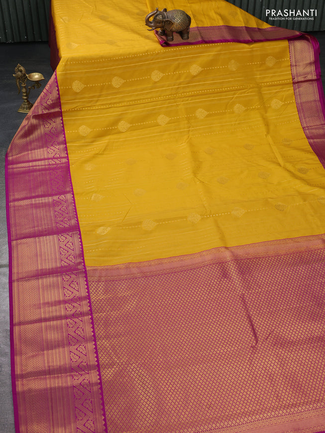 Semi kanchipuram silk saree yellow and purple with allover zari weaves and long zari woven border