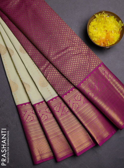 Semi kanchipuram silk saree pista green and purple with allover zari weaves and long zari woven border