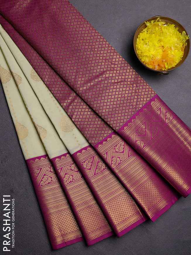 Semi kanchipuram silk saree pista green and purple with allover zari weaves and long zari woven border