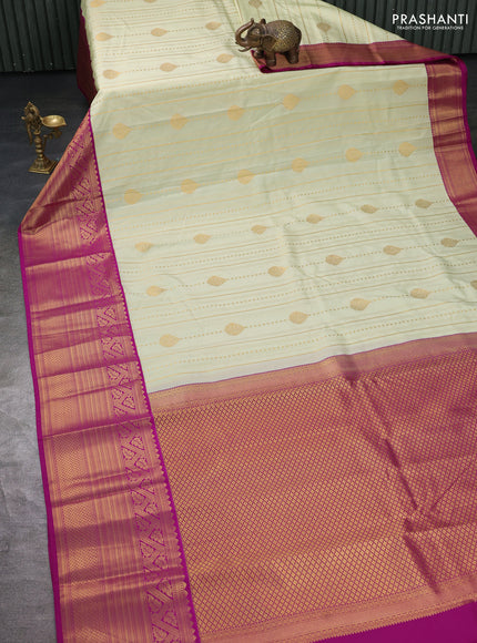 Semi kanchipuram silk saree pista green and purple with allover zari weaves and long zari woven border