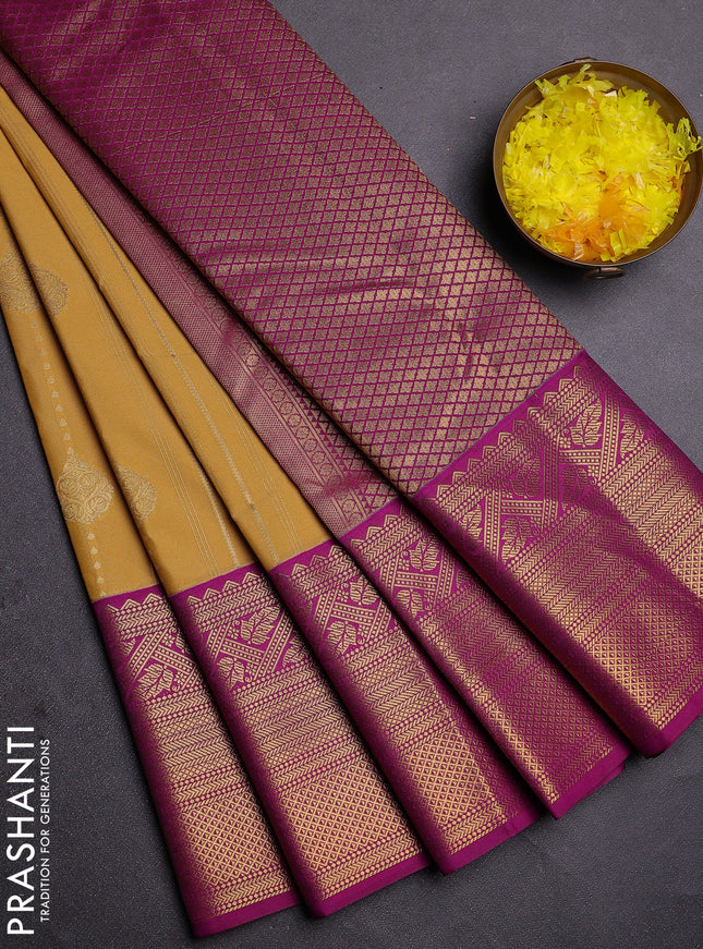 Semi kanchipuram silk saree yellow and purple with allover zari weaves and long zari woven border