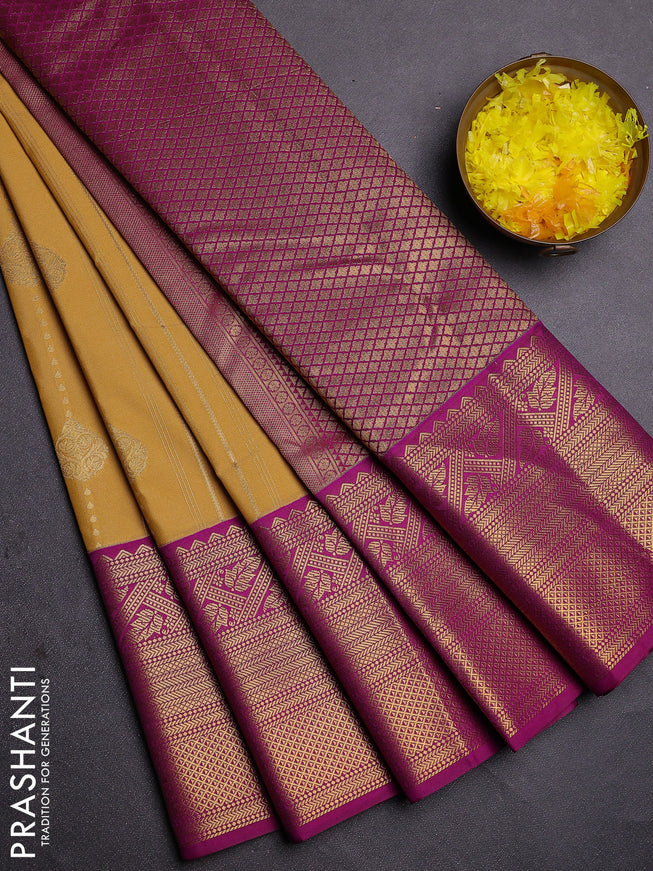 Semi kanchipuram silk saree yellow and purple with allover zari weaves and long zari woven border