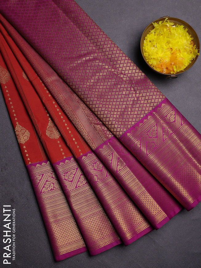 Semi kanchipuram silk saree rust and purple with allover zari weaves and long zari woven border