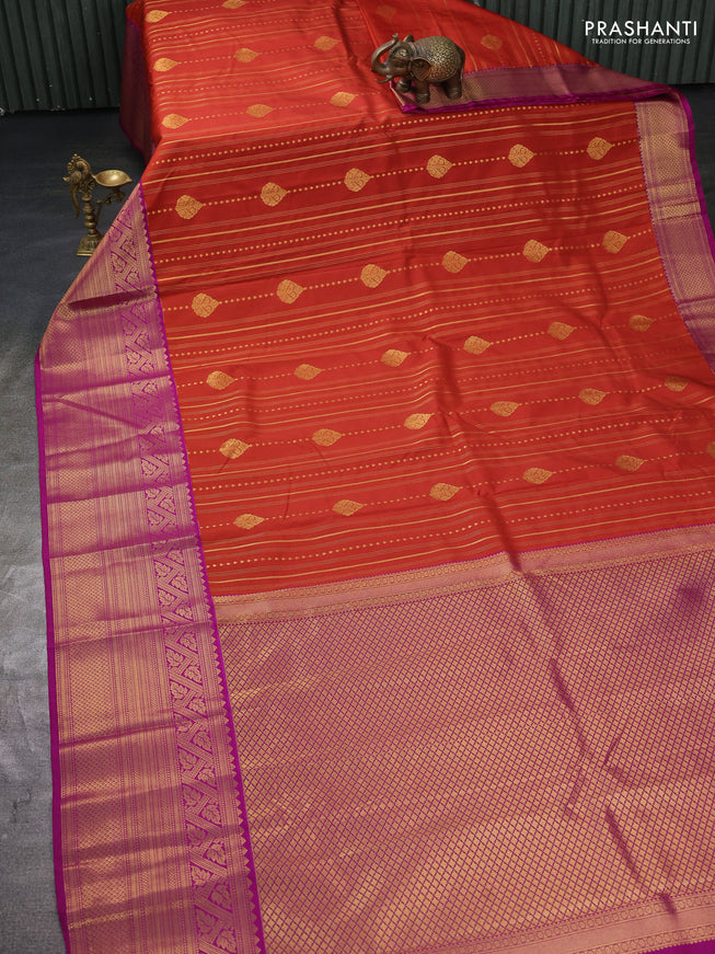 Semi kanchipuram silk saree rust and purple with allover zari weaves and long zari woven border