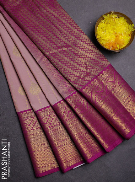 Semi kanchipuram silk saree pastel pink and purple with allover zari weaves and long zari woven border