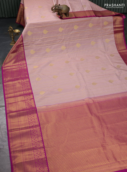 Semi kanchipuram silk saree pastel pink and purple with allover zari weaves and long zari woven border