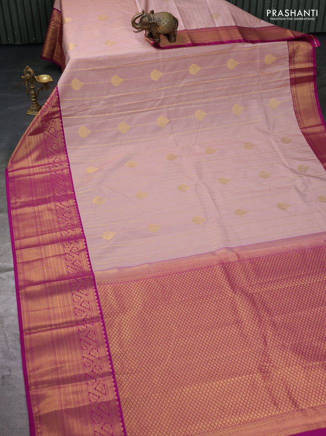 Semi kanchipuram silk saree pastel pink and purple with allover zari weaves and long zari woven border