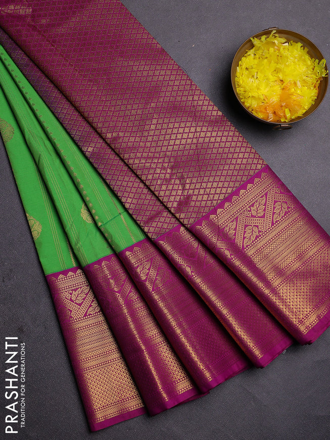 Semi kanchipuram silk saree light green and purple with allover zari weaves and long zari woven border