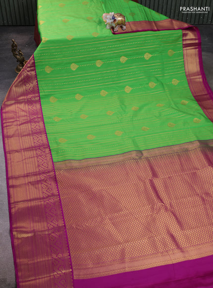 Semi kanchipuram silk saree light green and purple with allover zari weaves and long zari woven border