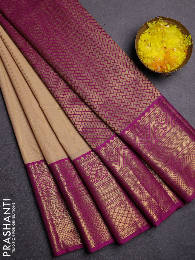 Semi kanchipuram silk saree sandal and magenta pink with allover zari weaves and long zari woven border