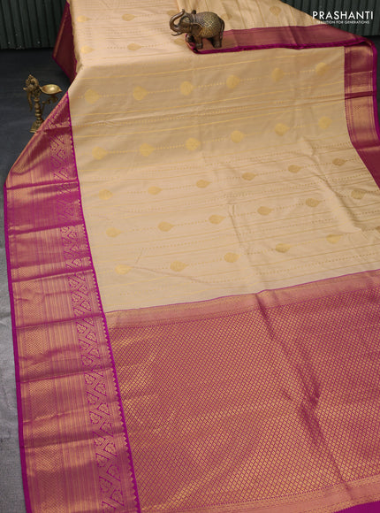 Semi kanchipuram silk saree sandal and magenta pink with allover zari weaves and long zari woven border