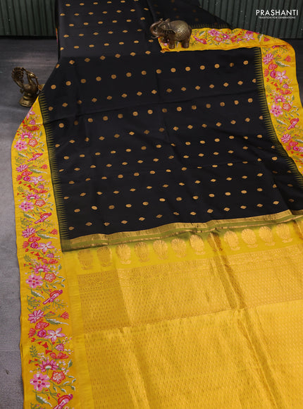 Pure gadwal silk saree black and yellow with zari woven buttas and temple design embroidery border