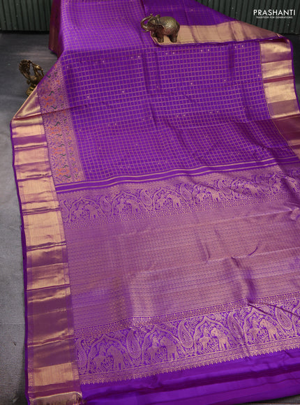 Pure kanchipuram silk saree purple with allover zari checks & buttas and long zari woven border